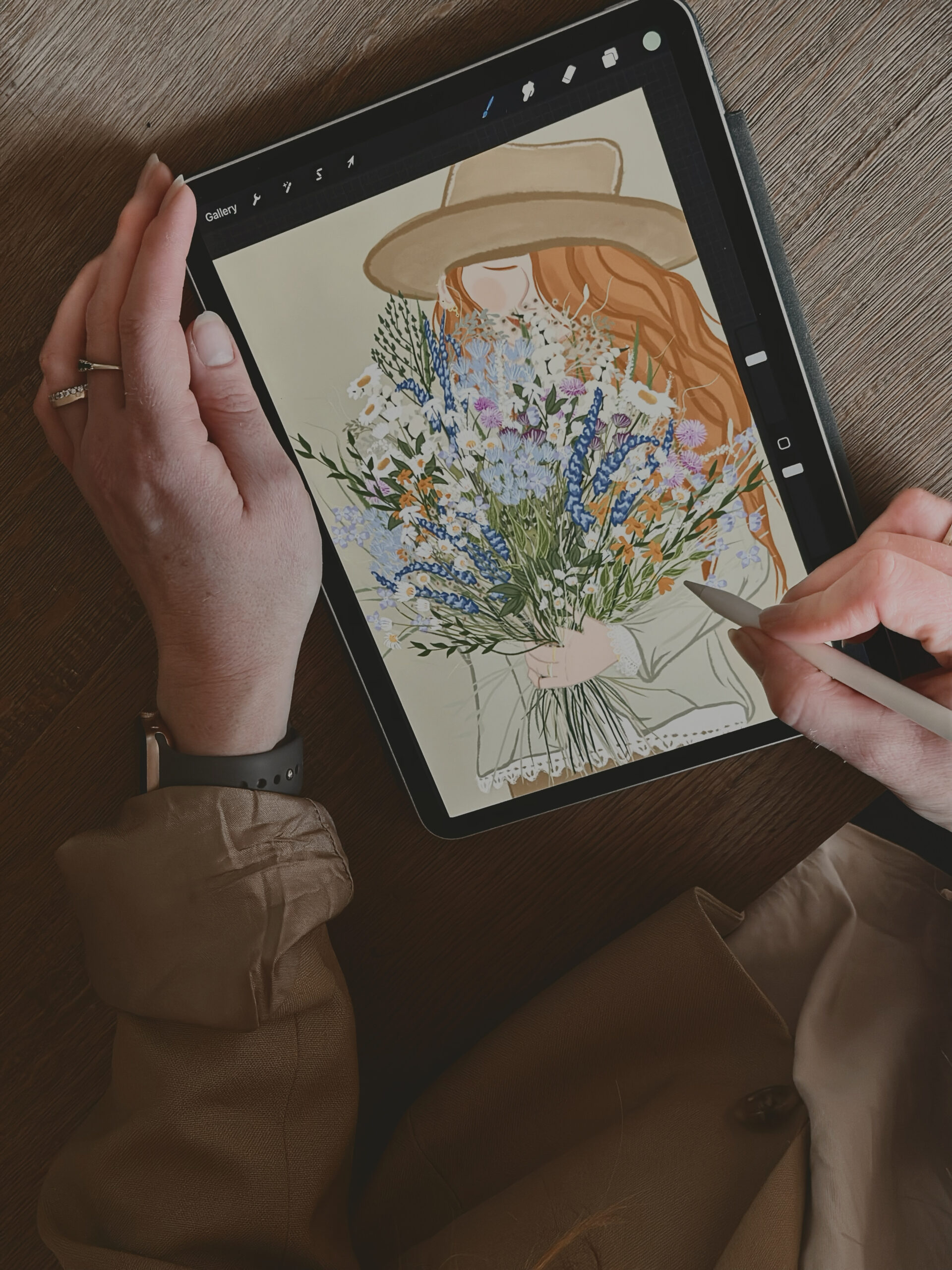 Nicolet Boon creating a new illustration of a girl with flowers