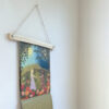 Use a wooden poster hanger to hang the Studio By Nicolet Calendar.